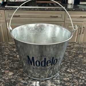 MODELO GALVANIZED DOUBLE SIDED METAL ICE/ BEER BUCKET W BUILT IN BOTTLE OPENER
